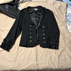Cool Black Jacket with a dash of military flair